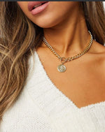 Load image into Gallery viewer, t bar necklace with coin in gold tone
