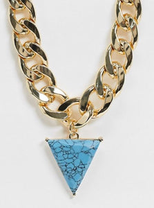 necklace with curb chain and faux turquoise triangle pendant in gold tone